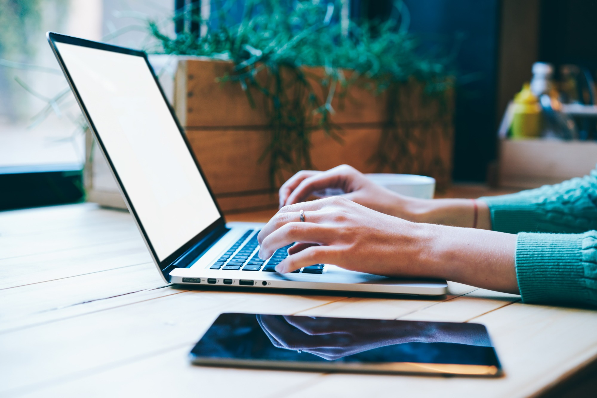 Woman searching Google on laptop